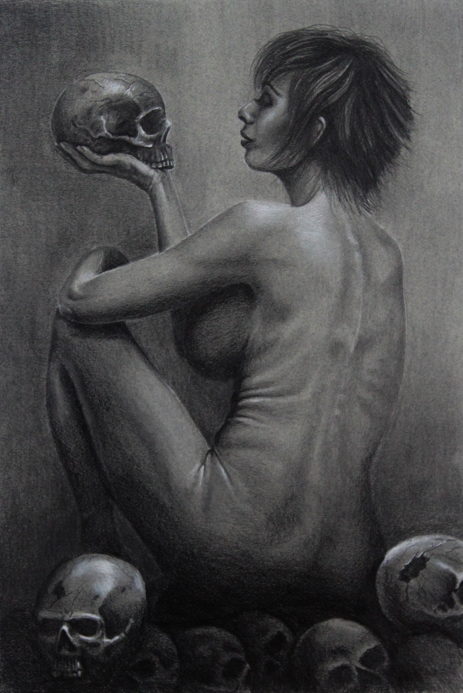 Woman holding skull gothic portrait